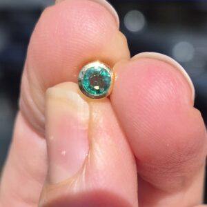 Alternative view of 18k 0.6g bezel set emerald pendant