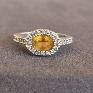 14k 3.8g white gold, diamond, and topaz ring- sz4.5