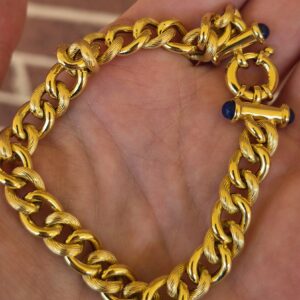 14k 10.4g textured cuban link bracelet with fancy clasp- 8"