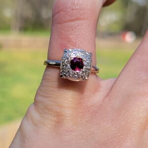 Alternative view of 14k 3.1g diamond and ruby ring- sz4.75