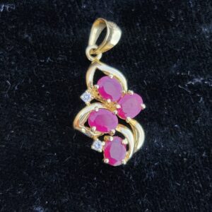 14k 1.5g Oval Ruby & Diamond Charm