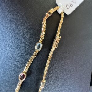 14k 6.9g Gold w/stones bracelet 7”
